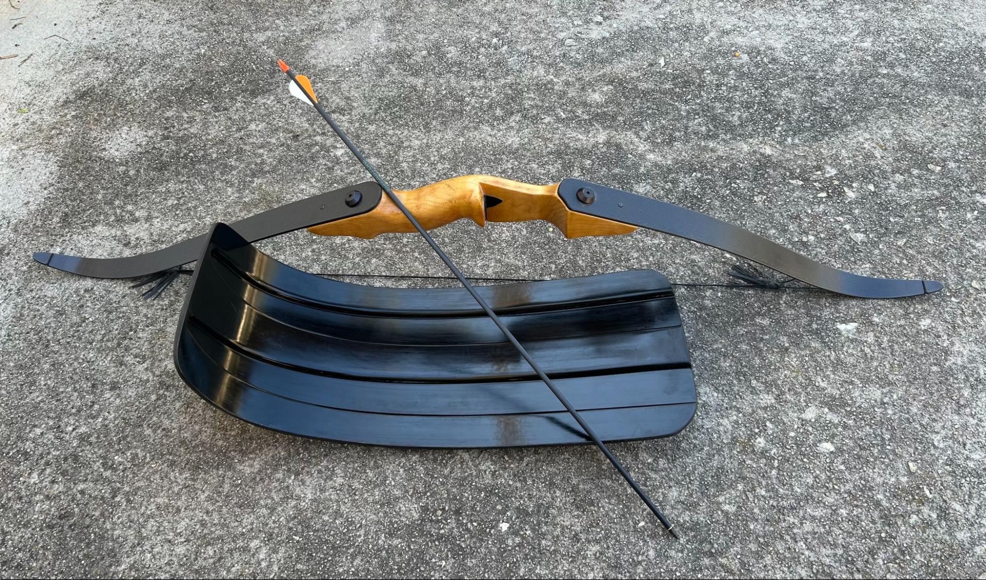 An R&D manager at one of the major archery companies once told me that you could not build bow limbs out of carbon fiber, due to its extreme stiffness. Using a dropped ply schedule of 3K unidirectional carbon fiber tape and 3K plain weave fabric, these bow limbs were autoclave cured at 45PSI. 50 pound draw weight and 200 FPS arrow velocity.